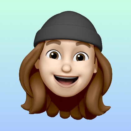 Apple Memoji representation of Brett smiling